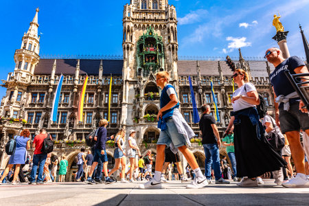 Munich, Germany - July 22, 2023: Panoramic view of Marienplatz town hall of Marien Square in Munich,...