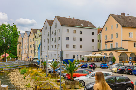 Passau, Germany - July 21, 2023: View of colorful houses on srteet, Passau, Bavaria, Germany.