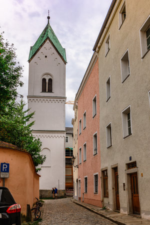 Passau, Germany - July 21, 2023: View of Beautiful and cozy city. Colorful houses on srteets, Passau, Bavaria, Germany. Vertical photoのeditorial素材