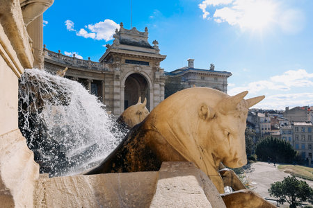 Panoramic view of beautiful Longchamp Palace complex with huge fountain, statues and flowering garden, Marseille, France. High quality photoの写真素材