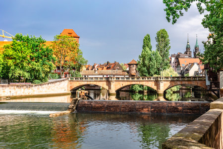 Colourful historic old town with half-timbered houses of Nuremberg. Bridges over Pegnitz river. Nurnberg, eastern Bavaria, Germany. High quality photoの写真素材