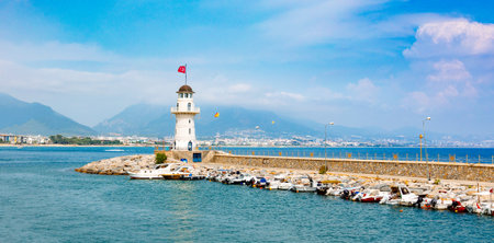 Panoramic view of old lighthouse in Alanya port. Landscape view of Mediterranean coast, Alanya, Turkey. High quality photoの写真素材