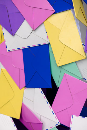 Colorful paper envelopes. Bright banner design, multicolored background. Vertical photoの写真素材