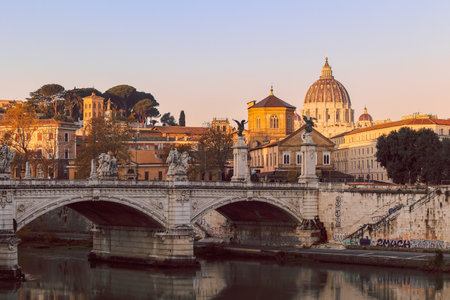 Rome in morning. Panoramic view of Castel SantAngelo and Bridge in Rome with reflection in Tiber river.の写真素材