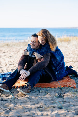 Portrait happy beautiful couple in love enjoying picnic. High quality photoの写真素材