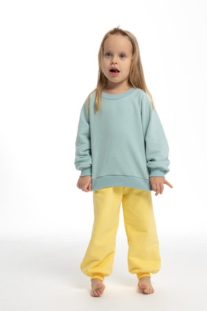 Portrait of beautiful cute little toddler girl. Child with funny face. Pretty smile kid in studio on white background. High quality photoの写真素材