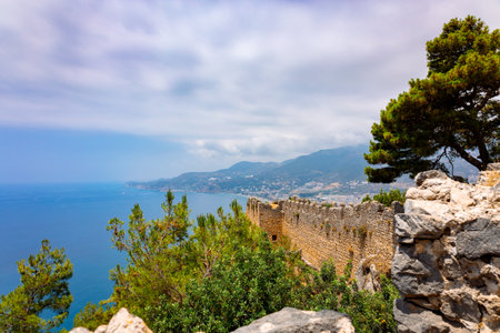 Landscape view old walls of fortress on Mediterranean coast. View of Alanya Castle, stone ruins in Alanya, Turkey. High quality photoの写真素材