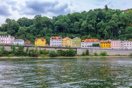 Panoramic view of colorful row of houses at river Danube, Passau, Bavaria, Germany. High quality photoの写真素材