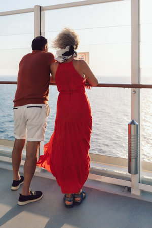 Couple in love on cruise ship. Man and woman in love enjoying their romantic vacation. Vertical...