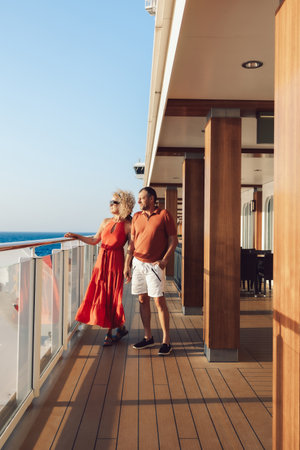 Married couple on cruise ship. Attractive couple on deck with cruise ship. Vertical photo. High quality photoの写真素材