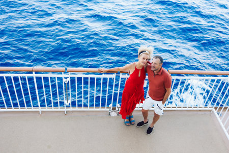 Couple in love on cruise ship. Man and woman in love enjoying their romantic vacation. High quality photoの写真素材