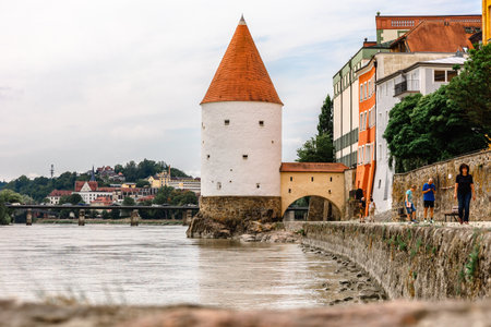 Panoramic view Schaibling Tower and promenade on river Inn, Passau, Lower Bavaria, Germany.