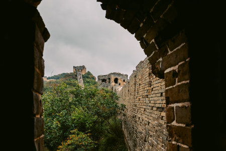 Aerial view of Simatai section of Great Wall of China in its original, un-restored state. Watchtowers perched on mountain peaks, Beijing, China. High quality photoの写真素材
