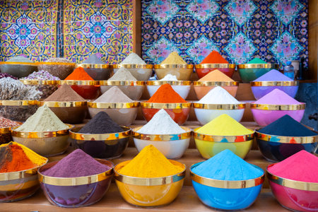 Traditional spices market. Pots and wooden tubs stand in row with colorful tea, spices, fruits, roots, flowers. Street bazaar. Dubai, UAE.の写真素材