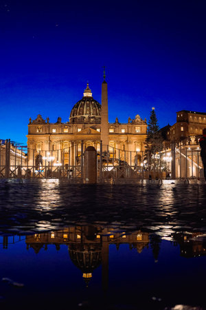 Vatican, Vatican City - December 7, 2023: St Peters Basilica and St Peters Square against night sky in Vatican City, Rome, Italyのeditorial素材