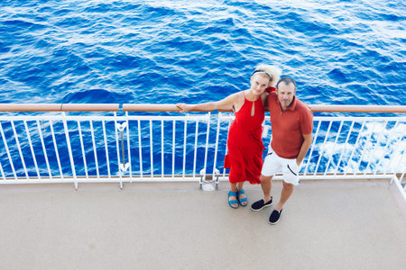 Married couple on cruise ship. Attractive couple on deck with cruise ship. High quality photo