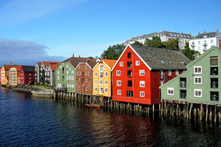 Panoramic view on famous wooden colored houses in Trondheim city, Norwaの写真素材