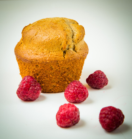 Raspberry muffin isolated on white background の写真素材