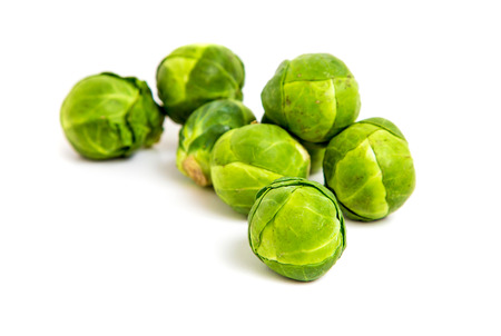 fresh brussels sprouts on white backgroundの写真素材