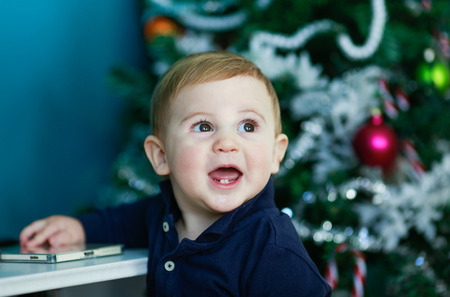 blonde baby portait - laughing babyの写真素材