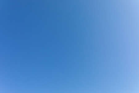 clear blue sky. gradient from dark to light.