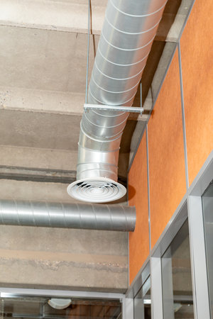 Bare ceiling with air duct and air conditioner pipe. Air flow and ventilation system. interior...