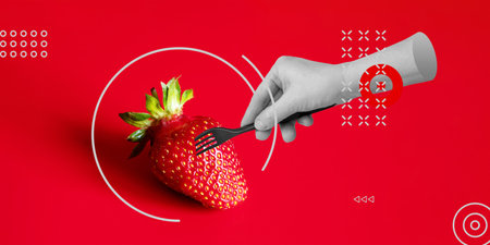 Vegetarianism, raw food, diet concept. Strawberries on a fork in an abstract hand on a red background. minimalist contemporary art collageの写真素材