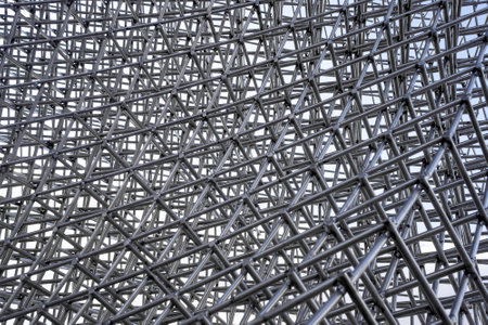 Architectural, construction, engineering background. A lot of metal rods welded in the form of a dense lattice.の写真素材