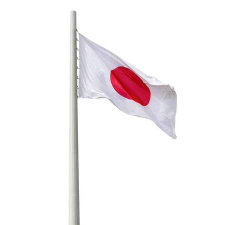 The flag of Japan flutters on a flagpole on a white background.