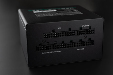Computer modular AC power supply unit. New unplugged black dark modular PSU power supply unit...