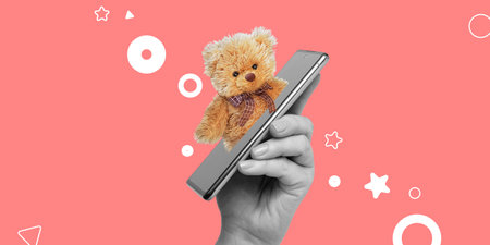 Sale of children's goods, marketplaces, mobile applications for online trading, games for the youngest children concept. A soft bear looks out of a smartphone screen. Minimalist art collageの写真素材