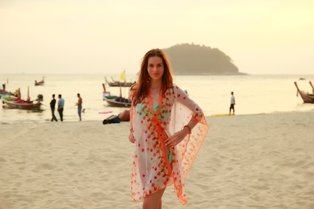 Woman on the beach at tropical resort.の写真素材