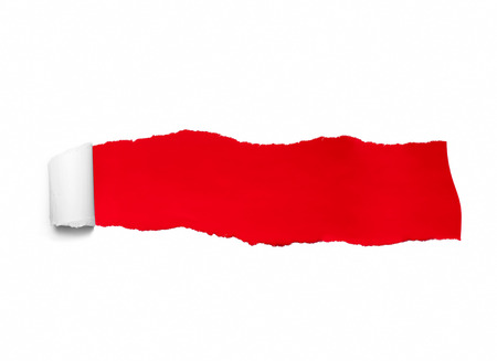 Ripped white paper over red color background. Concept for message.の写真素材