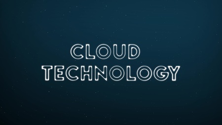 Abstract glowing text CLOUD TECHNOLOGY on dark blue digital backgroundの写真素材