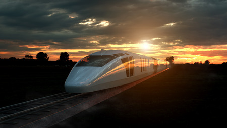 Electric passenger train at sunset backlit by a bright orange sunburst under an ominous cloudy sky....