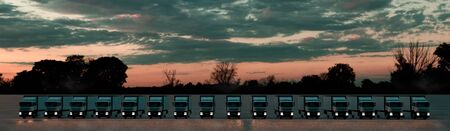 Logistics concept. Group of cargo trucks in row under a Dramatic Sun. Front view. 3D illustration