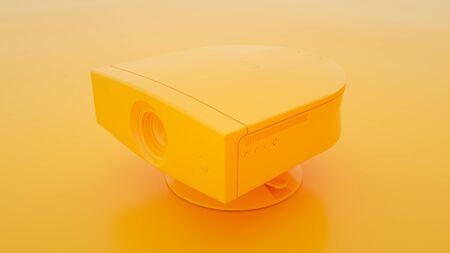 Multimedia Projector on yellow background. 3d illustration.の写真素材