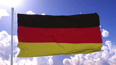 German flag fluttering at the background of clear blue sky. 3d renderingの写真素材