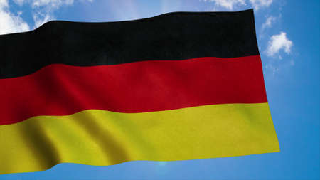 Germany flag waving in the wind, blue sky background. 3d renderingの写真素材
