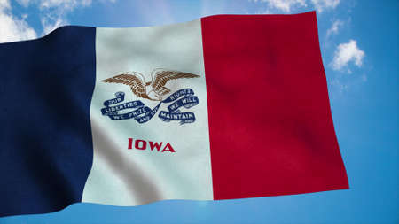 Iowa flag on a flagpole waving in the wind, blue sky background. 3d renderingの写真素材