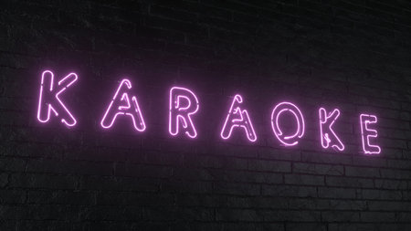 KARAOKE - realistic neon sign on dark brick wall background. 3d renderingの写真素材