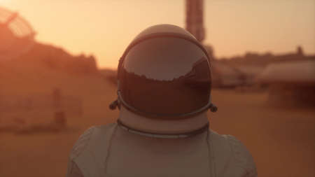 Astronaut on the planet Mars. Astronaut walking on the surface of Mars. Colonization concept. 3d renderingの写真素材