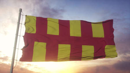 Northumberland flag, England, waving in the wind, sky and sun background. 3d rendering.の写真素材