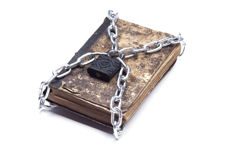 Old vintage tattered book lock with chain and padlock on white backgroundの写真素材