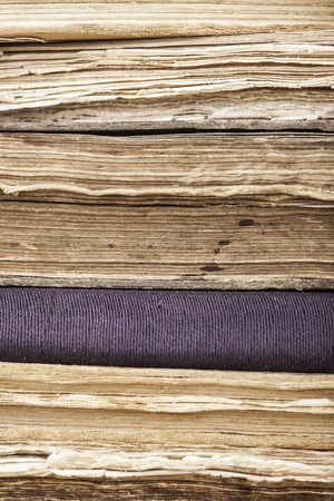 Background of stack old books close upの写真素材