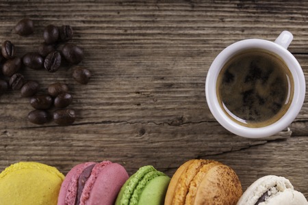 macaroons close up on the old wooden board vintage backgroundの写真素材