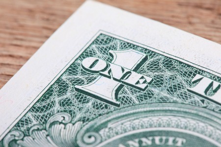 Digit One from dollar banknote close up