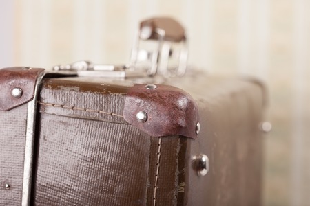 old vintage suitcase close up in the background wallpaperの写真素材