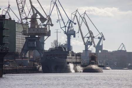 SAINT-PETERSBURG, RUSSIA - APRIL 03, 2016 : Two russian submarines at berth Admiralty shipyard in...