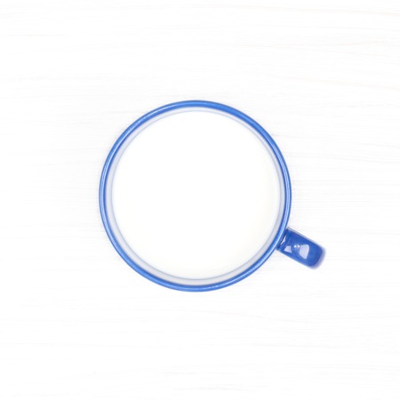 a Cup of milk on white background top viewの写真素材